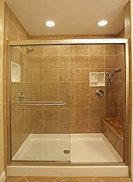 Narrow tiled shower stall with corner wall shelves for small. Small Small Space Shower Bathroom Tiles Design Novocom Top