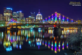 Rainbow Colors On The Rachel Carson Bridge Reflect In The Allegheny River Pittsburgh Skyline Pittsburgh City Covered Bridges