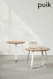 38 inch retro style round wooden coffee table with bottom shelf in natural brown. Pin Op Puik Design