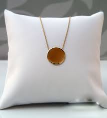It's an excellent hedge against inflation because its price usually rises when the cost of living increases. Solid 9ct Gold Disc Necklace In Yellow Rose Or White Personalised Disc
