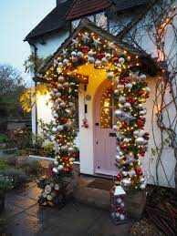 How To Create An Instagrammable Front Door Display For Christmas Front Door Christmas Decorations Christmas House Lights Christmas Arch