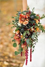 Bouquets | events by mayuri. Bright Bronze Wedding Inspiration Red Bouquet Wedding Bridal Bouquet Fall Cascading Wedding Bouquets