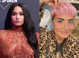Demi lovato has explained the reason for her bold new cropped haircut, revealing that she used to hide behind her long locks while battling her eating disorder. Demi Lovato Goes For Pretty In Pink With Bold New Hair Color E Online