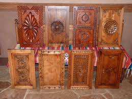 This versatile line of mexican pine furniture is perfect for furnishing many rustic themes, including, mexican rustic, southwest, log cabin,western ranch and santa fe styles. New Mexico Style Door Panel Choices By Carved Custom Cabinets For Furniture Kitchen Library Or Bath Cabinets Spanish Decor Spanish Style Homes Spanish Style