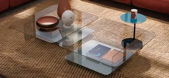 The coffee table is the glue that brings the style and the social aspects of a living room or family room together. Cava Natuzzi Italia