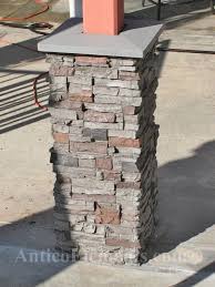 Wrapping the post its self in a light duty kitchen bag will do it, mike oehler the godfather of underground building did this with the house he built on a shifting hillside in 1975, burying in dirt with posts and no concrete and the house is sound. Faux Stone Columns Post Wraps Column Wraps Exterior Stone House Exterior Stone Columns