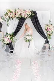 Black And White Wedding Party Modernize Your Black White Wedding With A Splash Of Pink Gold White Wedding Arch White Wedding Ceremony Black White Wedding