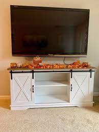 Woven Paths Farmhouse Sliding Barn Door Tv Stand For Tvs Up To 65 White Reclaimed Barnwood Walmart Com Fall Apartment Decor Fall Living Room Decor Fall Room Decor