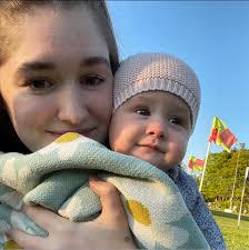 Can anyone recommend a helmet for an 8 year old with long hair, often worn  in a highish ponytail? Her current one we can't get adjusted right and it  just ends up