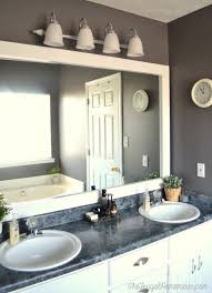 I hoard old picture frames and because i've collected for so long, how to make a mirror from a picture frame seemed like a great project to share. How To Frame Out That Builder Basic Bathroom Mirror For 20 Or Less The Frugal Homemaker