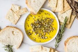 Extra Virgin Olive Oil Herb Dip Is A Garlicky Flavorful Accompaniment To Any Bread This Copycat In 2020 Olive Oil Dip For Bread Bread Dipping Sauce Appetizer Recipes