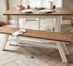 If you're looking for a simple, stylish way to add conviviality to your dining room, a dining table bench is your solution. Hart Reclaimed Wood Dining Bench Pottery Barn