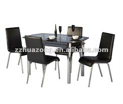 Choose the dining room table design that defines your family's style and character. 4 Seater Dining Set Black Glass Dining Table And Chrome Chairs Buy Square Glass Dining Table Black Lacquer Glass Dining Table Modern Oval Glass Dining Table And Chairs Product On Alibaba Com