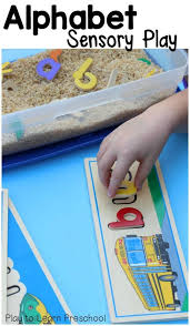 Alphabet Sensory Play Fun With Wooden Puzzles Kbn Sensory Activities For Kids Sensory Play Preschool Writing Learning Letters