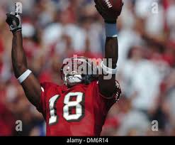 San Francisco 49ers' Fred Amey (18) celebrates a punt returned for a  touchdown against the St. Louis Rams at Monster Stadium in San Francisco