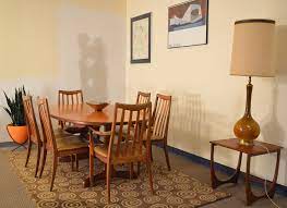 Woman with far too much makeup on eating dinner, 80s makeup. Extending Teak Dining Table By G Plan This Is A 1980 S Teak Dining Table With A Pop Up Leaf That Can Be St Teak Dining Table Rosewood Furniture Dining Table