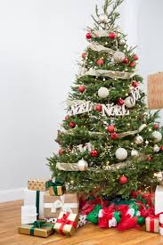 Decorative items can be placed along the garland. How To Make A Festive Deco Mesh Wreath For The Holidays Hgtv