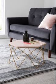 Find a great selection of wood coffee tables, metal accent tables, storage tables & more. Buy Hexagon Coffee Table From The Mnje Online Shop