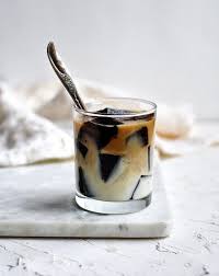 Bouncy Jiggly Squares Of Bittersweet Coffee Lusciously Light Sweetened Milk Coffee Jello Is The Dessert You Didn T Coffee Jello Asian Desserts Coffee Jelly