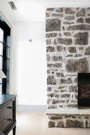 For over 30 years lew french has been designing one of a kind, exceptionally crafted works with stone and natural materials. How To Diy Over Grouted Stone Fireplace For Under 200 Chris Loves Julia