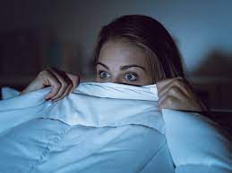 The wind forces open the curtained window. How To Get Paid 1 000 To Watch Horror Movies On Halloween