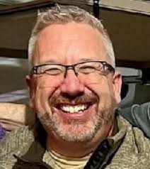 John L. Olson Obituary