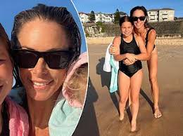Cricket WAG Candice Warner shows off her incredibly toned figure as she  goes for a beach jog in Sydney
