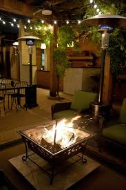 What Is Not To Love About A Roaring Fire On The Patio At Oliva On The Hill With Images Outdoor Tables Decor Outdoor Decor