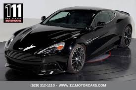 Image result for Jet Black 2014 Aston Martin