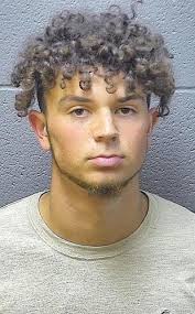 Men charged in attempted robbery, wounding