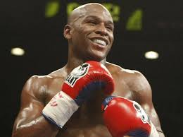 Download Floyd Mayweather Smiling Red Boxing Gloves Wallpaper