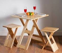 Folding wooden chair makeover and a giveaway! Folding Table And Folding Stools Small House Small Home Tiny House Tiny Home Small Spaces Small Small Room Design Folding Furniture Folding Dining Table