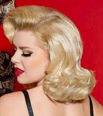 Eyecatching pin up girl hairstyles in 30 dos! Retro Pinup Blonde Hairstyle Hair Flip Teased Hair Vintage Hairstyles