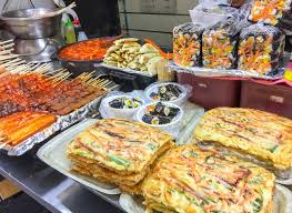 Spicy kimchi dumplings, a street food treat. 19 Must Eat Street Food And Korean Dishes In Seoul La Jolla Mom