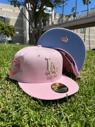 'authentic' new era original 59fifty fitted hat, black and pink alternating cotton panels, pink visor with a black undervisor and flip, raised embroidered team logo on front in pink, black, and white with matching team logo on back.conversion chart. Exclusive New Era Pinky Los Angeles Dodgers 50th Anniversary Season Patch 59fifty Fitted Icy Blue Uv White Sweatband Cap City