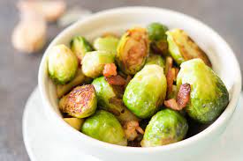Toss crispy roasted sprouts with toasted pepitas and sweet figs before serving them up to guests to make 'em more approachable. The 17 Best Side Dishes For A Prime Rib Dinner