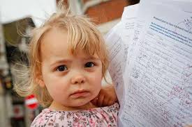 Residents gather outside Maidstone Town Hall, in Jubilee Square, to hand in  petition against plans to close Freshland Road play area