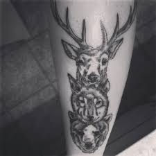 With many meanings, some men choose a wolf tattoo because it symbolizes power, strength, freedom, and raw animal instinct as an alpha wolf, while others love wolf tattoo designs for their representation of family, unity, and loyalty via the wolf pack. Deer Wolf Bear Best Tattoo Design Ideas Wolf Tattoo Bedeutung Tattoo Bedeutungen Tiertattoos