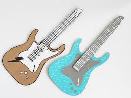 Diy Cardboard Electric Guitar By La Maison De Loulou Cardboard Guitar Diy Cardboard Guitar Kids