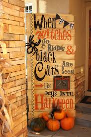 Halloween decorating themes for your home or office party. Front Porch Outdoor Halloween Decorating Ideas The Garden Glove Halloween Outdoor Decorations Outdoor Halloween Halloween Diy