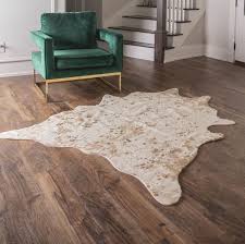 The best way to keep your cowhide rug in good shape and looking new and clean is to vacuum and give it a shake outside once a week. Acid Wash Faux Cowhide Rugs 5 X 6 And 5 X 6 8 Jane