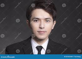 Closeup of Young Asian Handsome Business Man Face Stock Image
