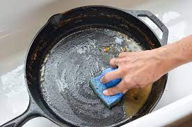 Scrub the bottom of the pan, as well, as the sides. How To Clean A Cast Iron Pan Without All The Mystery Once Upon A Chef