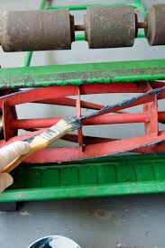 Lay down something to catch and metal filings and dirt near the blade. How To Sharpen A Push Mower Or A Reel Mower The Art Of Doing Stuff