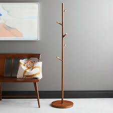 Inspired by this pottery barn print. Mid Century Coat Rack Entryway Organization