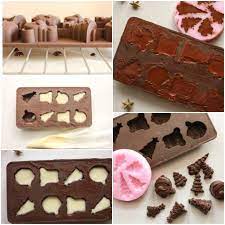 Using a spatula, run the chocolate off the molds. Easy Homemade Filled Chocolates A Delicious Homemade Candy Recipe Chocolate Molds Ma Chocolate Candy Recipes Candy Recipes Homemade Homemade Chocolate Candy