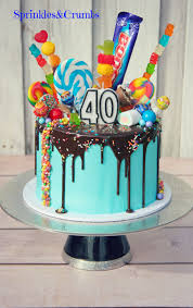 Blue Chocolate Drip Cake With Candy Candy Birthday Cakes Chocolate Drip Cake Drip Cakes