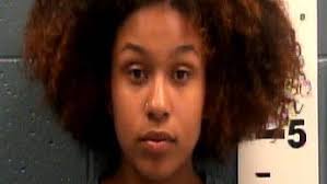 Woman suspected of threatening store patrons with knife