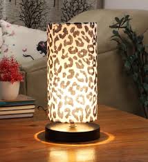Explore 60 listings for leopard print home at best prices. Buy Black Round Metal Base Table Lamp With Leopard Print Shade By Tu Casa Online Modern And Contemporary Table Lamps Table Lamps Lamps And Lighting Pepperfry Product