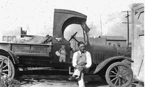 One of my treasured early family photos of Whittier shows my great uncle  Edwin Redman, sitting in front of his vintage milk truck in Whittier.....in  the late 1920's. He delivered milk for